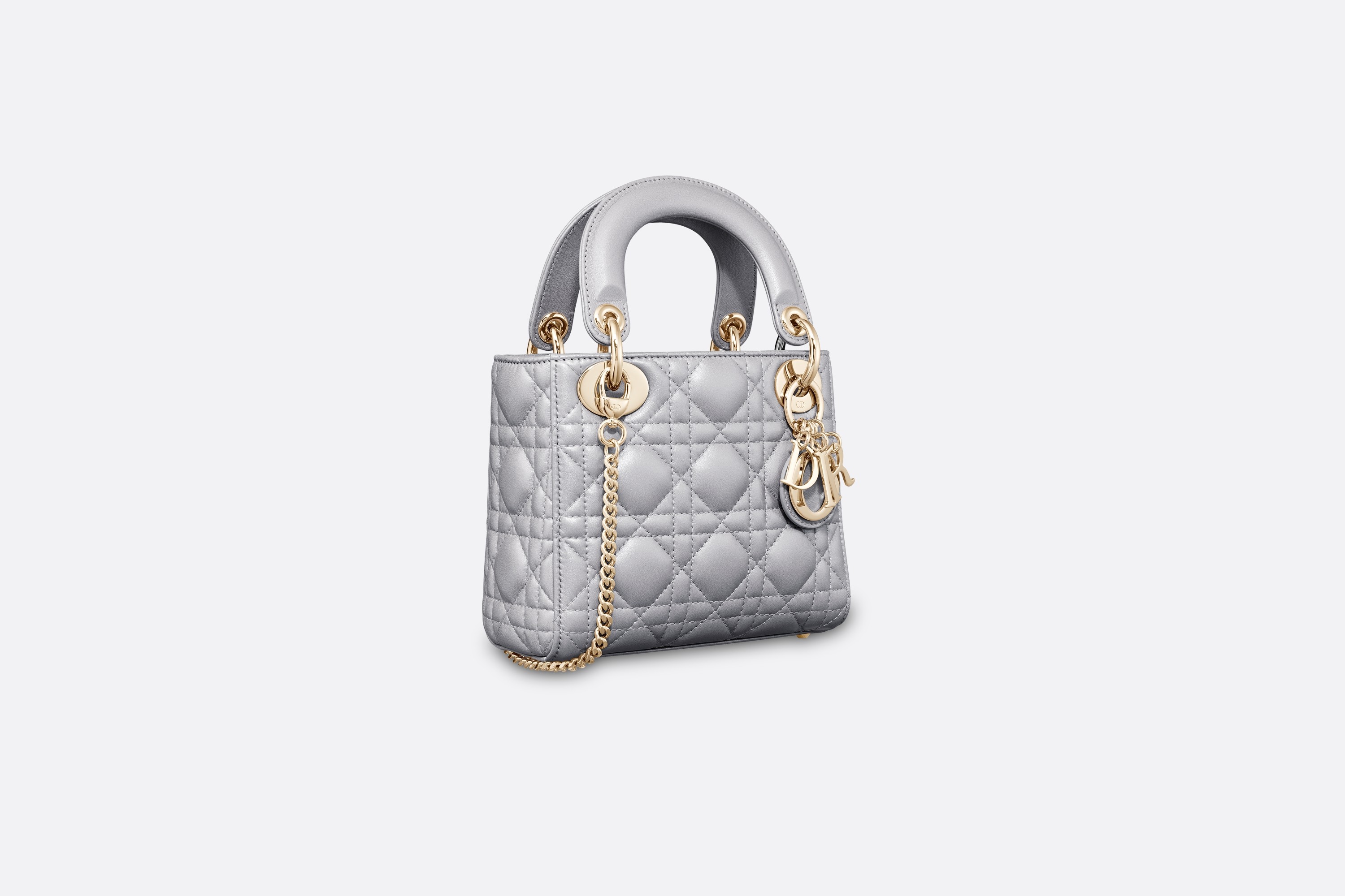 dior包包官网价格“Lady Dior”乳灰色珠光藤格纹小羊皮袖珍手提包